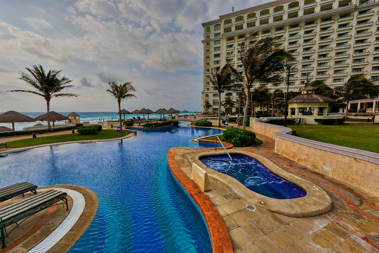 our-services-2 Idyllic tropical luxury resort with ocean views and pool in Cancun, Mexico.